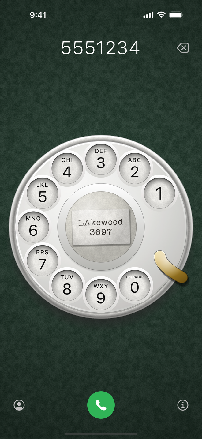 The dial on green felt, the card reading LAkewood 3697